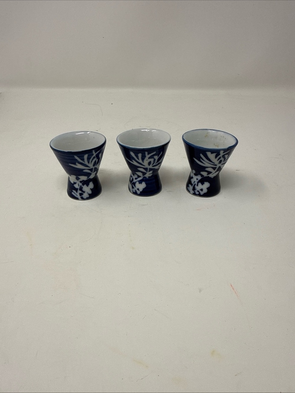 Vintage 1980’s Japanese Saki cups lot 3 Blue White Ceramic Flared Floral Branch
